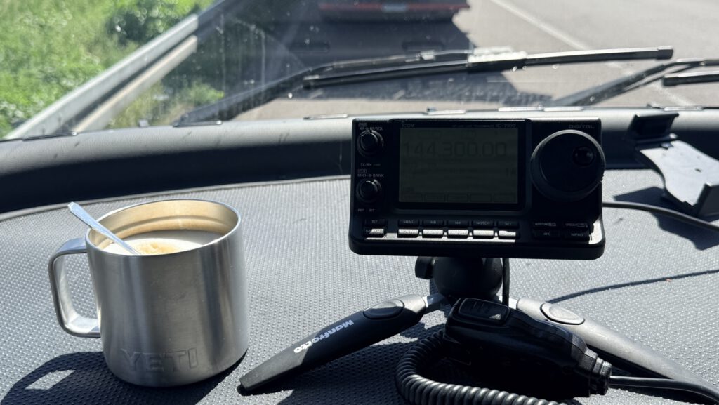 Coffee and the radio on the dashboard