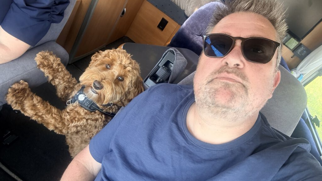 On the road in the mobile home with the dog
