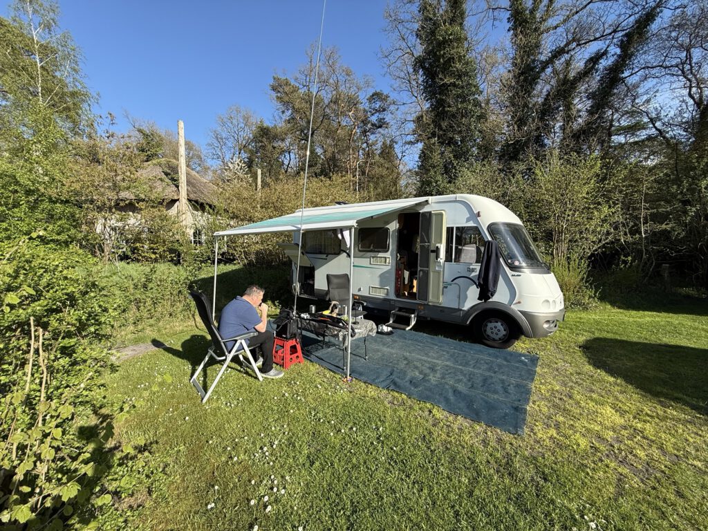 Mobile home and radio table at Camping Norgerberg