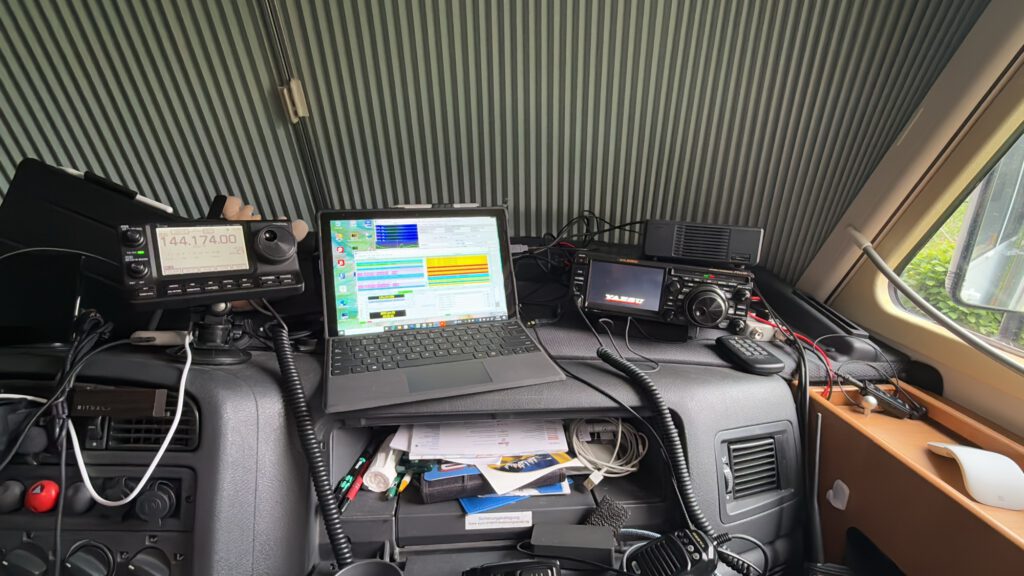 Radio shack inside the camper with laptop