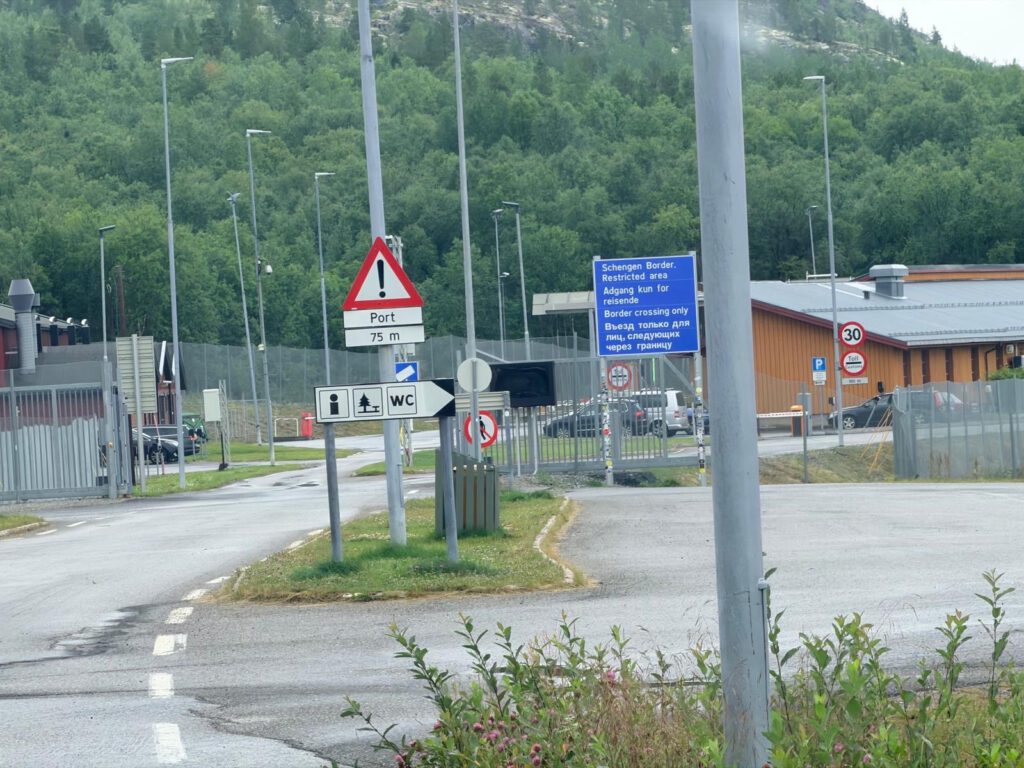 Border crossing road and signs