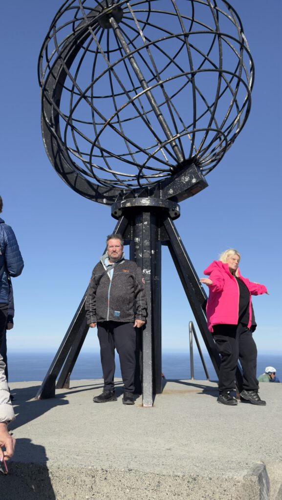 Visitors at the North Cape globe