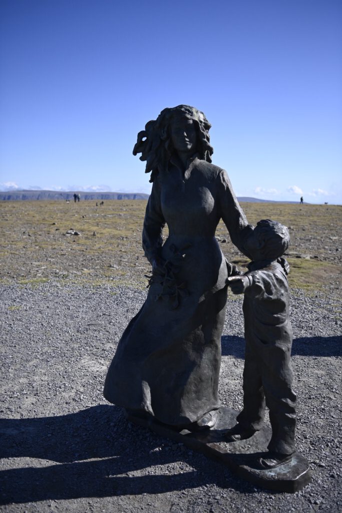 Statue of mother and child at Nordkapp